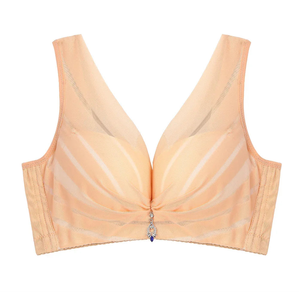 Peach wireless bra with sheer mesh details, designed for comfort and everyday support.