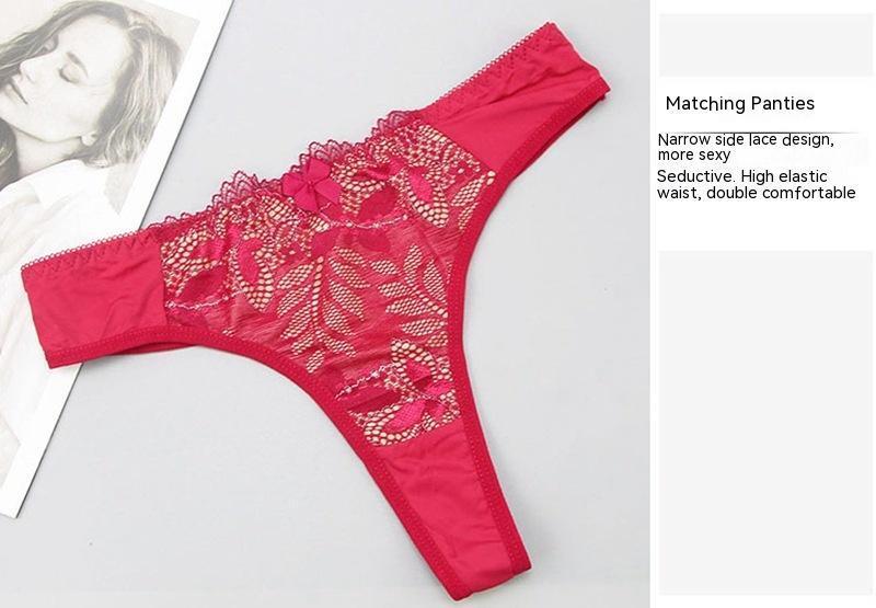 Pink lace women's thong panty with floral embroidery, designed for comfort and everyday wear.